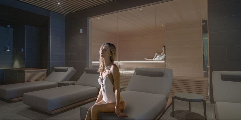 woman in luxury spa sauna trend